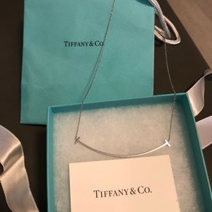Authentic Tiffany Co T Smile Necklace in 18K white gold. Stamped 750